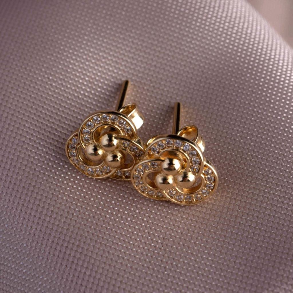 Brinco grenoble flor de círculos c/ zircônias ouro 18k