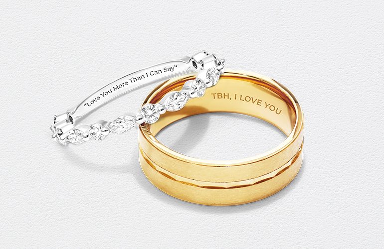 Aliança e meia aliança com frase gravada